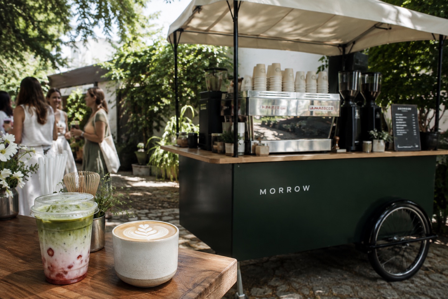 Morrow’s green coffee cart at a garden gathering